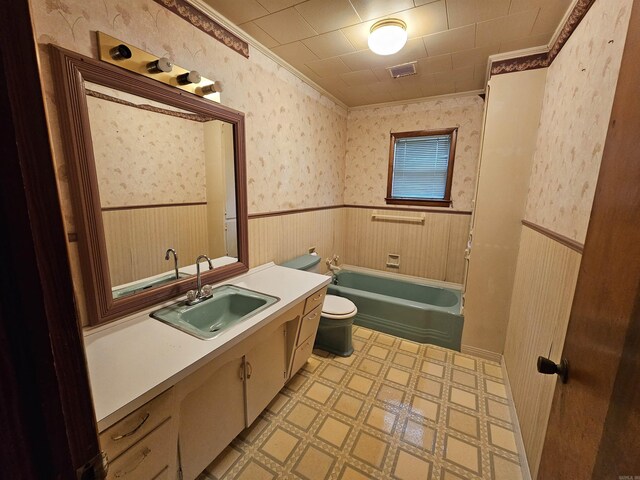 bathroom with toilet and vanity