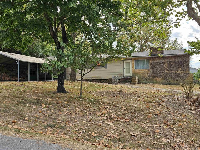 view of yard with a carport