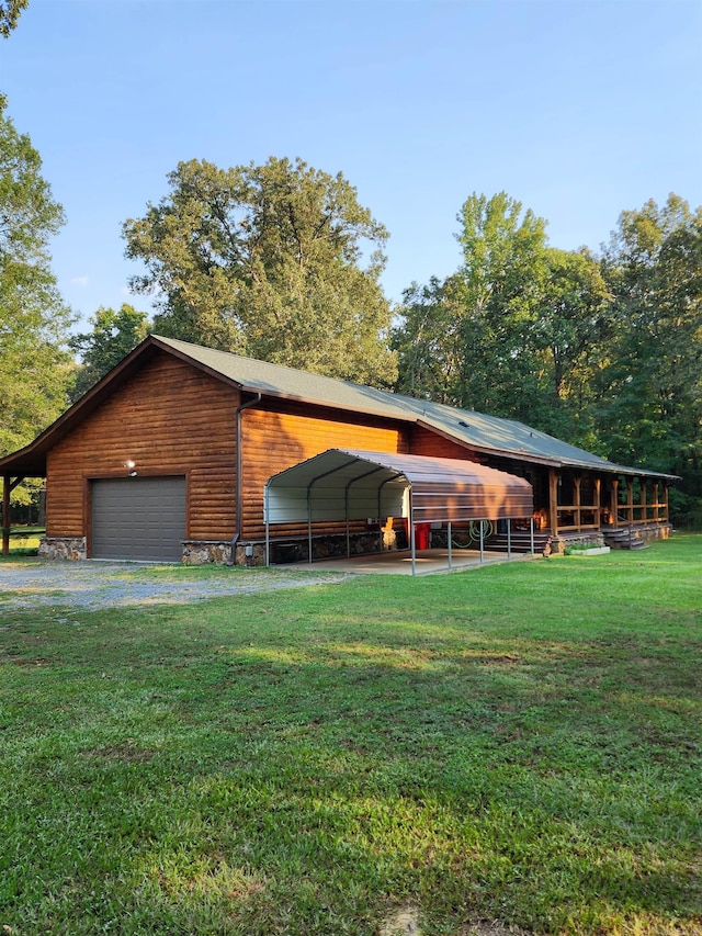 exterior space featuring a lawn and a garage