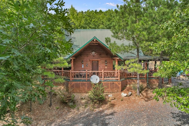 cabin featuring a wooden deck