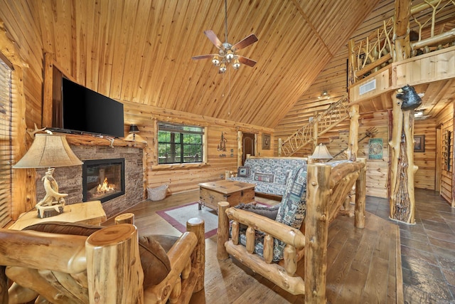 living room with wooden ceiling, a fireplace, high vaulted ceiling, hardwood / wood-style flooring, and ceiling fan