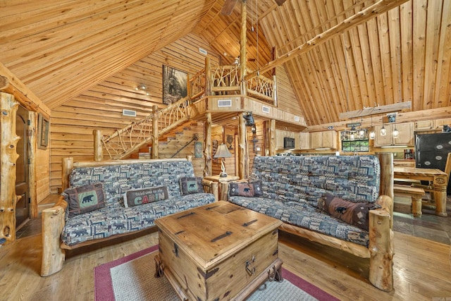 living room with high vaulted ceiling, wooden ceiling, and light hardwood / wood-style flooring