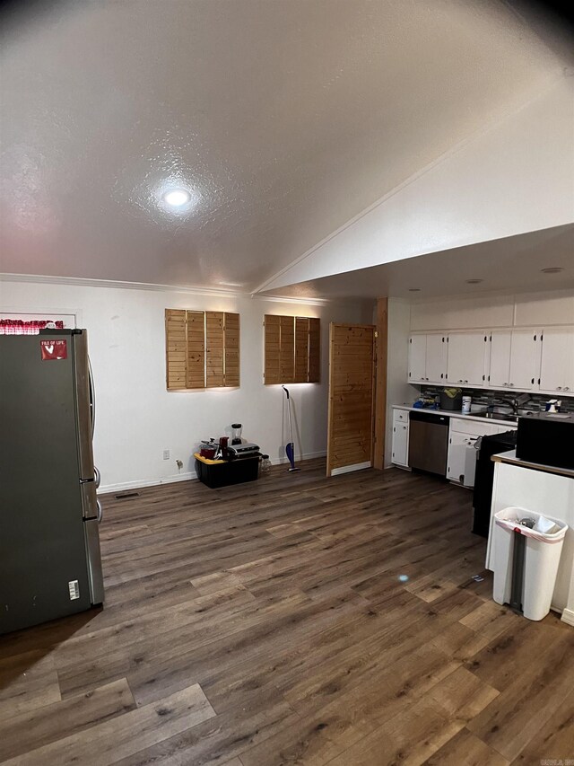 interior space with dark wood-type flooring and a textured ceiling