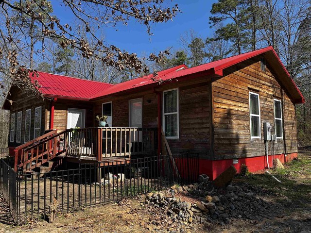 ranch-style house with a deck