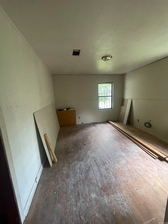 spare room featuring hardwood / wood-style flooring