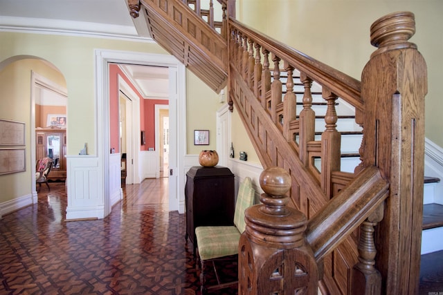 stairway with crown molding