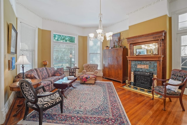 living room with a chandelier and hardwood / wood-style flooring