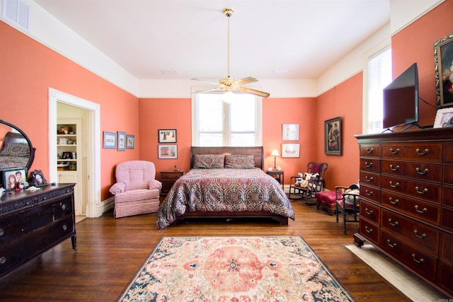 bedroom featuring dark wood-type flooring and ceiling fan