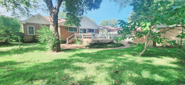 view of yard featuring a wooden deck