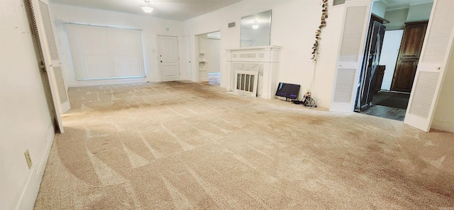 interior space featuring light carpet