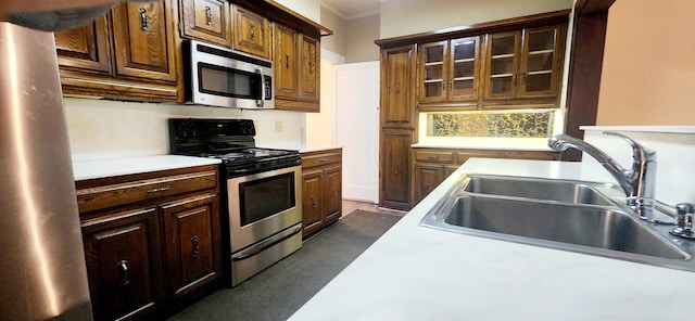 kitchen with appliances with stainless steel finishes and sink