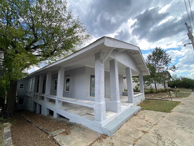 view of home's exterior with a porch