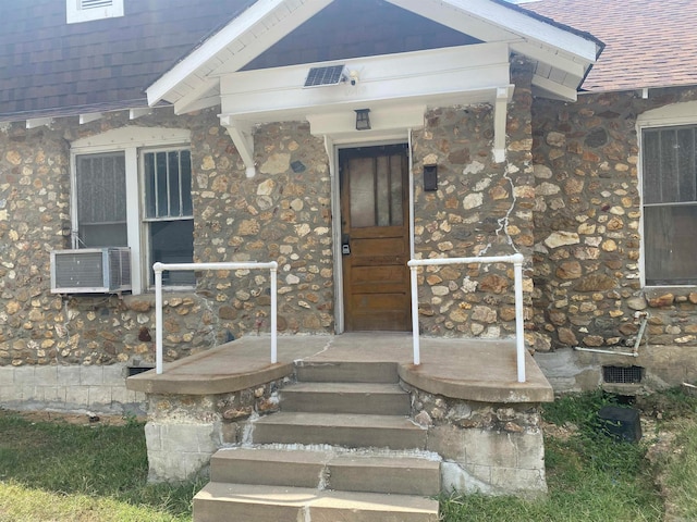 property entrance with cooling unit