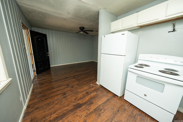 kitchen with white cabinets, white appliances, dark wood-type flooring, ceiling fan, and a textured ceiling