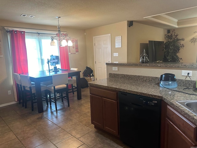 kitchen featuring tile patterned flooring, ornamental molding, a textured ceiling, dishwasher, and an inviting chandelier