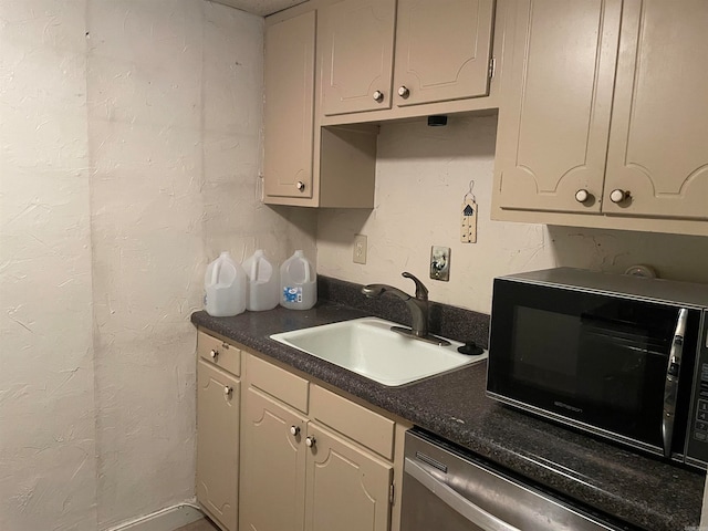 kitchen featuring dishwasher and sink