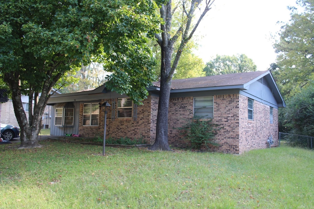 exterior space featuring a front lawn