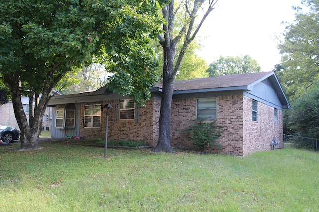 exterior space featuring a front lawn