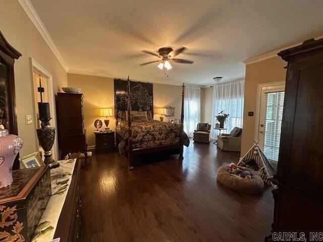 bedroom featuring ornamental molding, dark hardwood / wood-style flooring, and ceiling fan