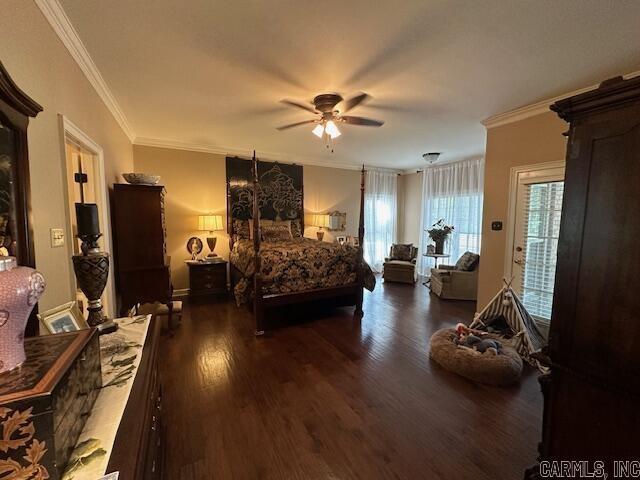 bedroom featuring access to exterior, crown molding, a ceiling fan, and wood finished floors