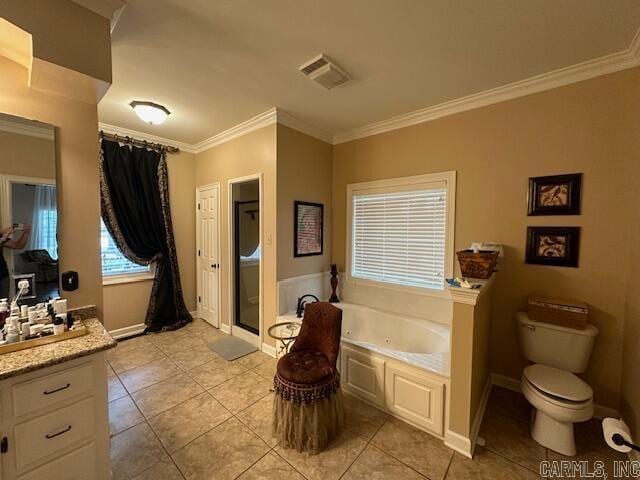 full bathroom featuring separate shower and tub, tile patterned floors, toilet, vanity, and ornamental molding