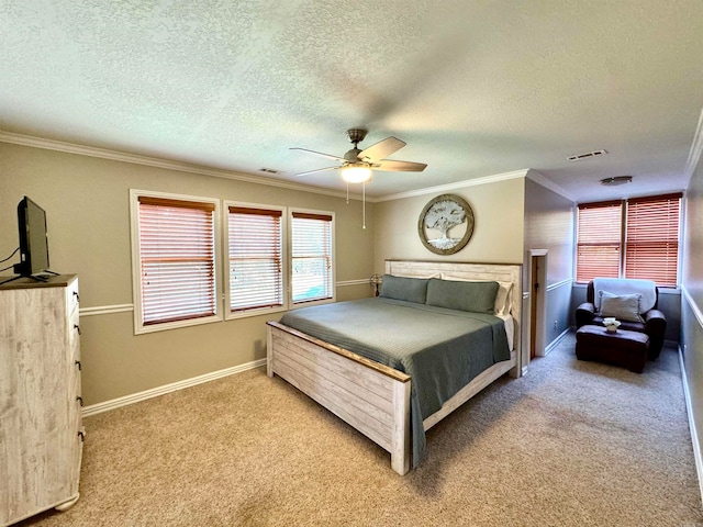 bedroom with crown molding, a textured ceiling, ceiling fan, and carpet flooring