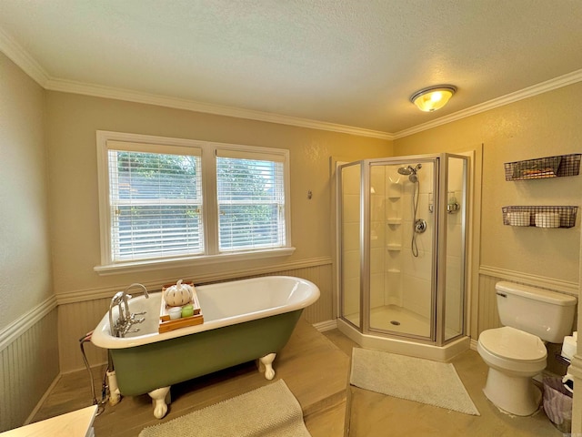 bathroom with ornamental molding, toilet, independent shower and bath, and a textured ceiling