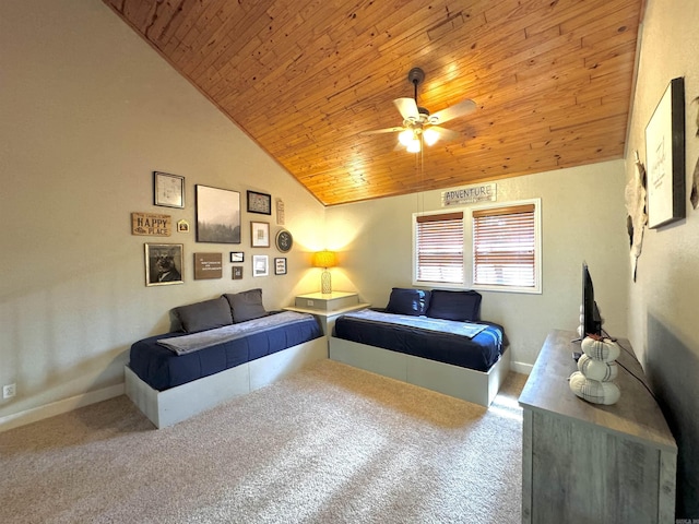 carpeted bedroom featuring baseboards, lofted ceiling, wood ceiling, and ceiling fan