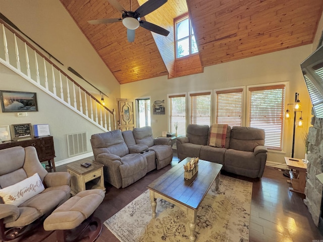 living room with visible vents, high vaulted ceiling, a healthy amount of sunlight, and stairs