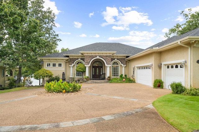 view of front of home featuring a garage