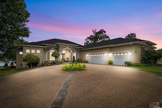 prairie-style home with a garage