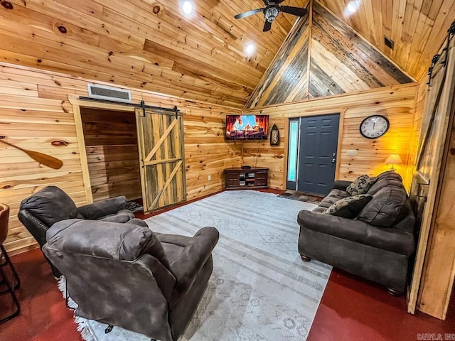 carpeted living room with wooden ceiling, a barn door, high vaulted ceiling, wood walls, and ceiling fan