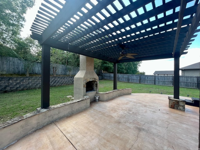 view of patio featuring an outdoor stone fireplace, a pergola, and ceiling fan