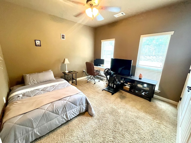 bedroom featuring carpet and ceiling fan