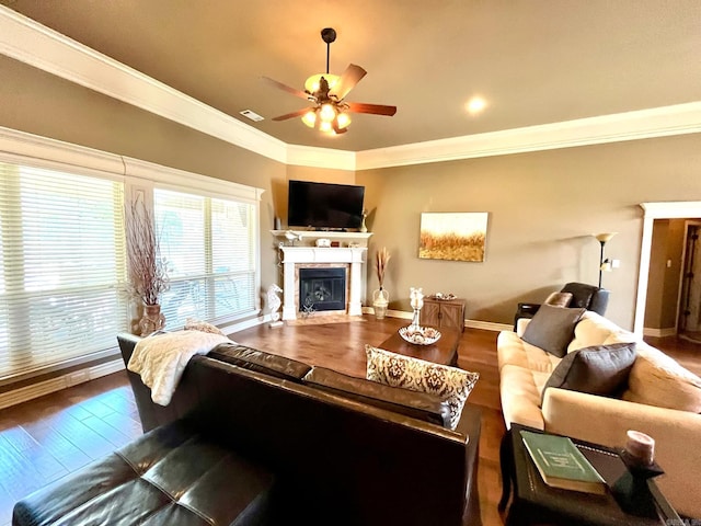 living room with crown molding, hardwood / wood-style flooring, and ceiling fan