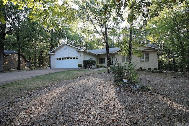 single story home with a garage