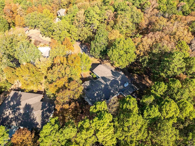 drone / aerial view with a view of trees