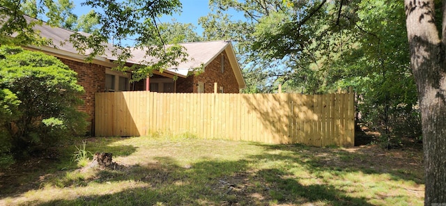 view of yard with fence
