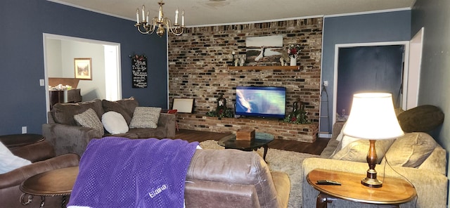 living room featuring brick wall, ornamental molding, wood-type flooring, and an inviting chandelier