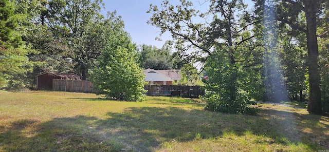 view of yard with fence