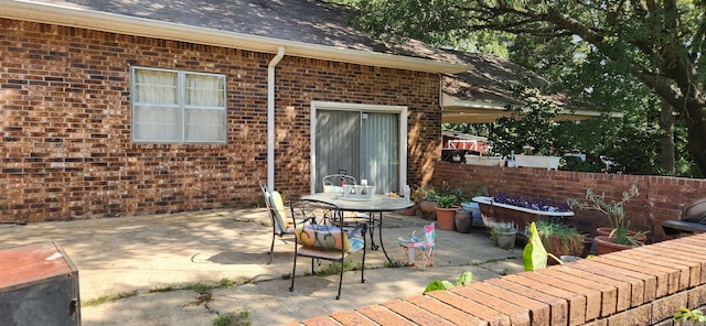 view of patio / terrace featuring a fire pit