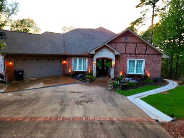 single story home with a garage