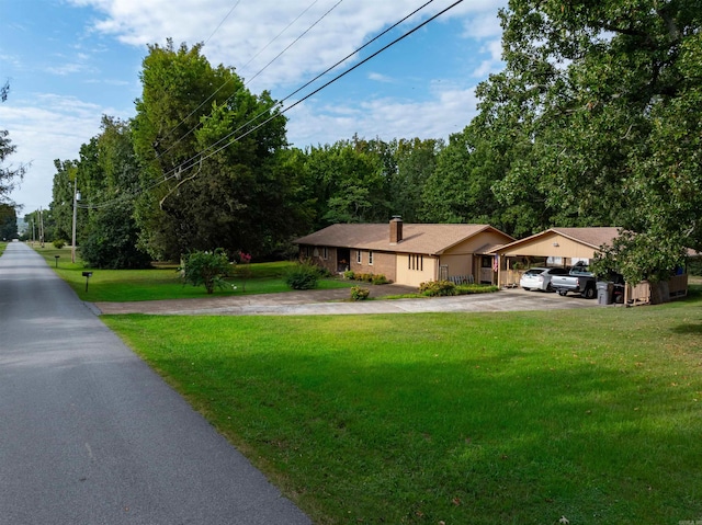 view of yard with a carport