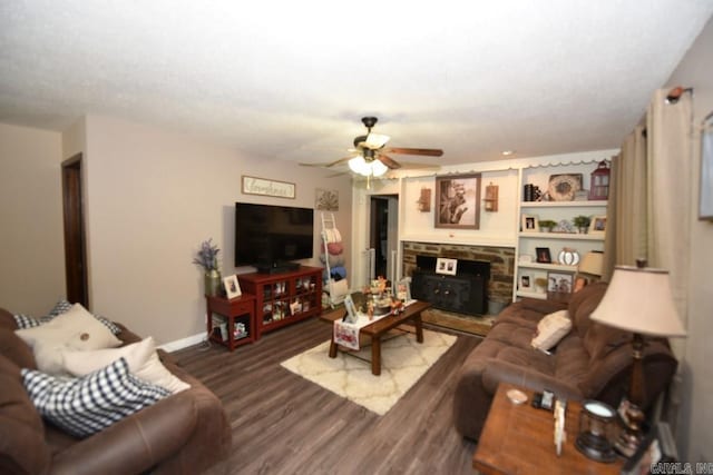 living room with ceiling fan and hardwood / wood-style floors