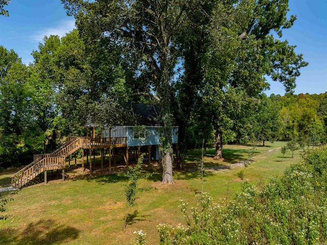 view of yard with a wooden deck