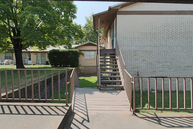 view of side of property featuring a lawn