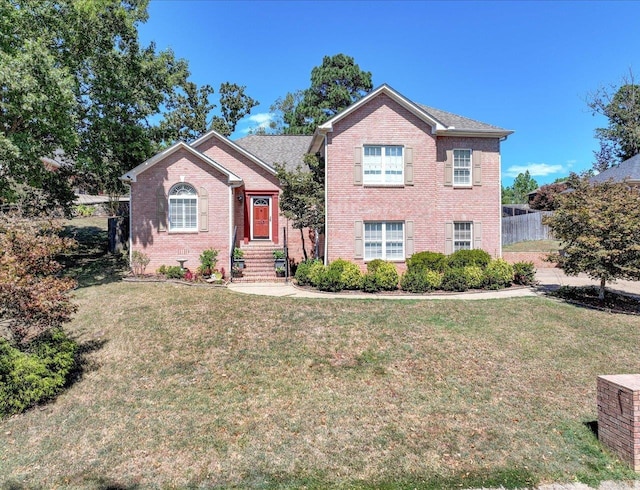 front facade featuring a front lawn