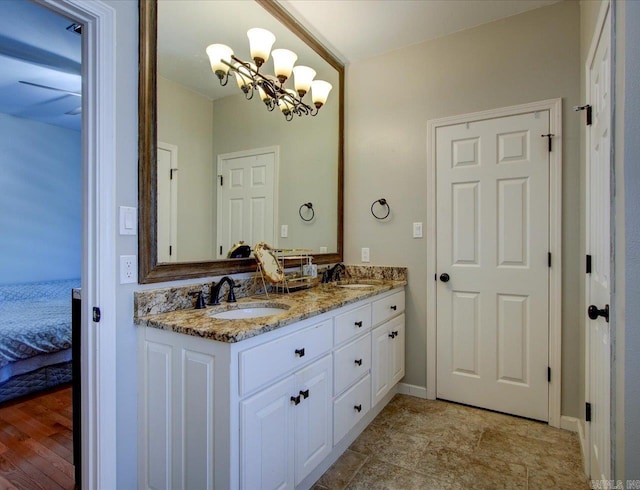 bathroom with hardwood / wood-style floors and vanity