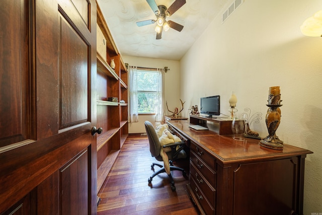 office area featuring dark hardwood / wood-style flooring, ceiling fan, and lofted ceiling