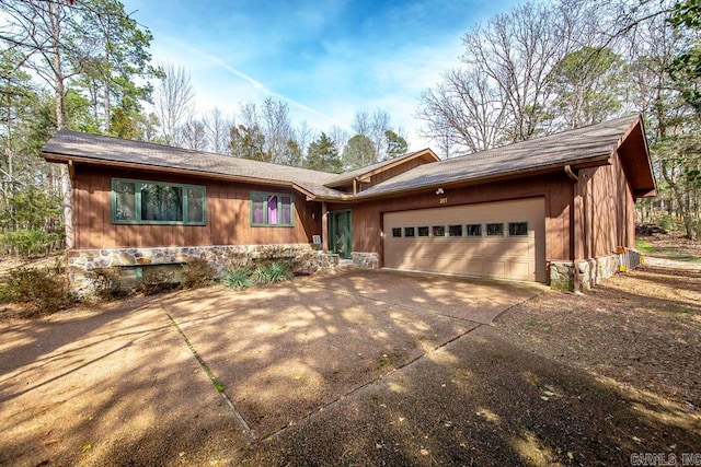 single story home featuring a garage